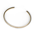 Engravable cuff bracelet in Yellow gold, top view