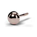 Half ball stud earring in rose gold, angled view with screw back post