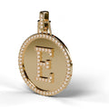 Diamond initial E medallion pendant in 14K yellow gold, angled view