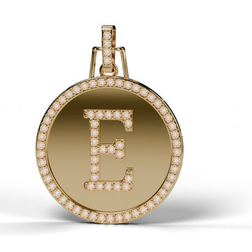 Diamond initial E medallion pendant in 14K yellow gold, front view