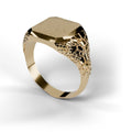 Men's signet nugget ring in 14K yellow gold, angled studio view