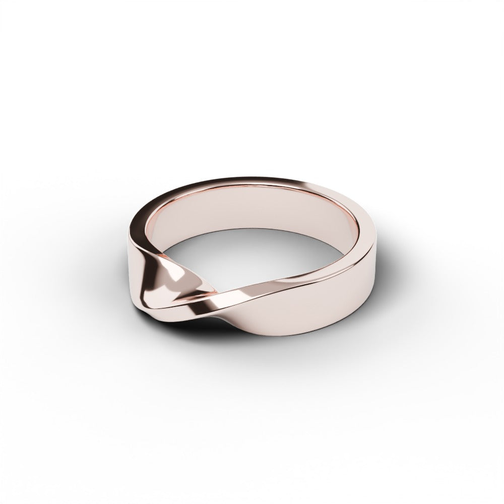 Men's Mobius wedding ring in 18k rose gold, angled view