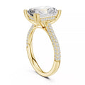 3 carat radiant cut hidden halo engagement ring in yellow gold, angled view