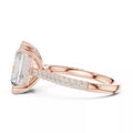 3 carat radiant cut hidden halo engagement ring in rose gold, side view