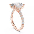 3 carat radiant cut hidden halo engagement ring in rose gold, angled view